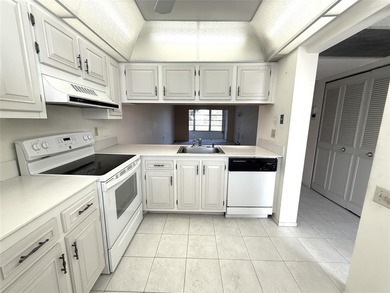 Discover the delightful charm of this distinctive property on Wynmoor Golf Course in Florida - for sale on GolfHomes.com, golf home, golf lot