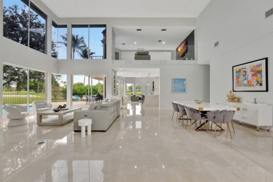 Luxury living in this magnificent gem nestled in the prestigious on Boca Grove Golf and Tennis in Florida - for sale on GolfHomes.com, golf home, golf lot