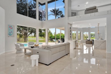 Luxury living in this magnificent gem nestled in the prestigious on Boca Grove Golf and Tennis in Florida - for sale on GolfHomes.com, golf home, golf lot