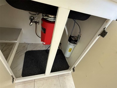 Discover the delightful charm of this distinctive property on Wynmoor Golf Course in Florida - for sale on GolfHomes.com, golf home, golf lot