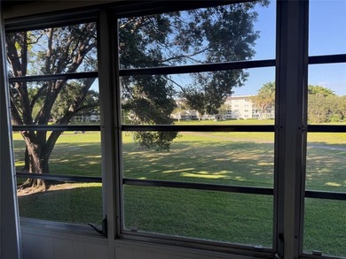 Discover the delightful charm of this distinctive property on Wynmoor Golf Course in Florida - for sale on GolfHomes.com, golf home, golf lot