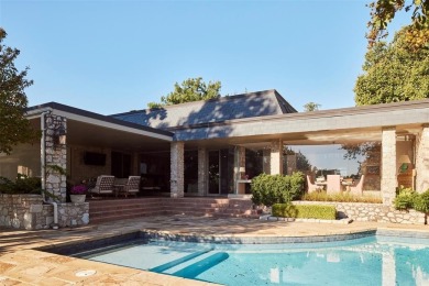 A stunning blend of mid-century design and modern luxury.This on Oklahoma City Golf and Country Club in Oklahoma - for sale on GolfHomes.com, golf home, golf lot