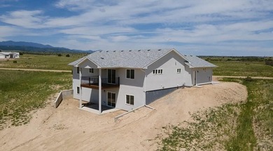 Fantastic open floor plan ranch home. Walkout basement partially on Hollydot Golf Course in Colorado - for sale on GolfHomes.com, golf home, golf lot