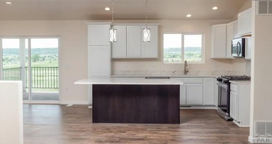 Fantastic open floor plan ranch home. Walkout basement partially on Hollydot Golf Course in Colorado - for sale on GolfHomes.com, golf home, golf lot