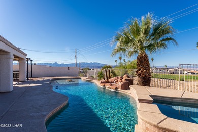 Welcome to this spacious 3-bedroom, 2-bathroom home with 1,826 on London Bridge Golf Course in Arizona - for sale on GolfHomes.com, golf home, golf lot
