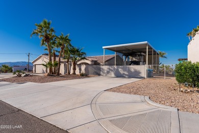 Welcome to this spacious 3-bedroom, 2-bathroom home with 1,826 on London Bridge Golf Course in Arizona - for sale on GolfHomes.com, golf home, golf lot