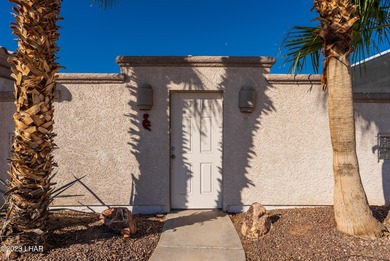 Welcome to this spacious 3-bedroom, 2-bathroom home with 1,826 on London Bridge Golf Course in Arizona - for sale on GolfHomes.com, golf home, golf lot