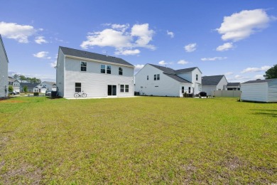 Welcome to 1102 Boswell Court -- a stunning home nestled in the on Wild Wing Plantation in South Carolina - for sale on GolfHomes.com, golf home, golf lot
