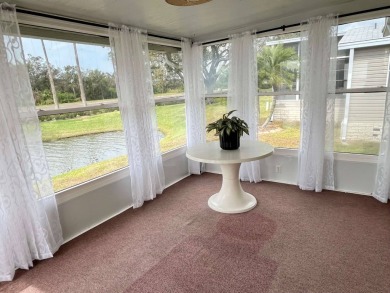 Charming Waterfront Retreat - 8711 26th Ave. E, Sun Key Village on River Run Golf Links in Florida - for sale on GolfHomes.com, golf home, golf lot