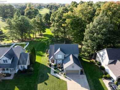 Nestled along the 10th hole of Thunderbird Golf Course, this on Thunderbird Hills Golf Club in Ohio - for sale on GolfHomes.com, golf home, golf lot