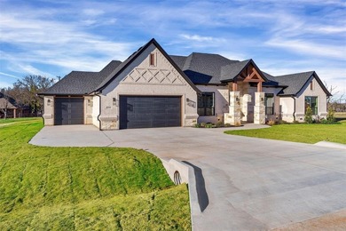 Located inside the guard-gated community of Pecan Plantation on Pecan Plantation Country Club in Texas - for sale on GolfHomes.com, golf home, golf lot