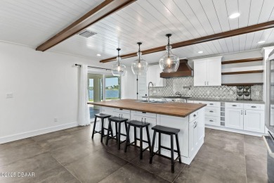 Experience the best of Florida living in this stunning two-story on Ocean Palm Golf Course in Florida - for sale on GolfHomes.com, golf home, golf lot