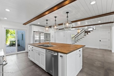 Experience the best of Florida living in this stunning two-story on Ocean Palm Golf Course in Florida - for sale on GolfHomes.com, golf home, golf lot