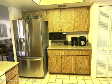 DESIRABLE GOLF COURSE HOME, FULLY FURNISHED, SITUATED ON A on Timber Pines Golf Course in Florida - for sale on GolfHomes.com, golf home, golf lot