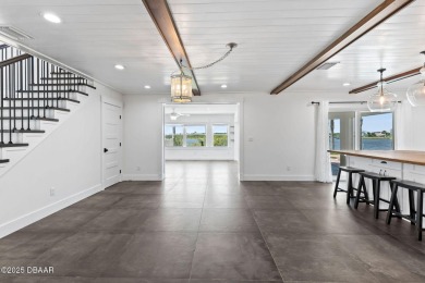 Experience the best of Florida living in this stunning two-story on Ocean Palm Golf Course in Florida - for sale on GolfHomes.com, golf home, golf lot