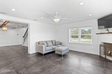 Experience the best of Florida living in this stunning two-story on Ocean Palm Golf Course in Florida - for sale on GolfHomes.com, golf home, golf lot