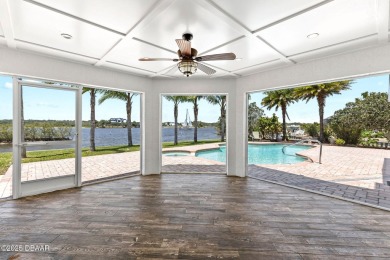 Experience the best of Florida living in this stunning two-story on Ocean Palm Golf Course in Florida - for sale on GolfHomes.com, golf home, golf lot