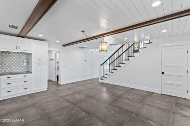 Experience the best of Florida living in this stunning two-story on Ocean Palm Golf Course in Florida - for sale on GolfHomes.com, golf home, golf lot