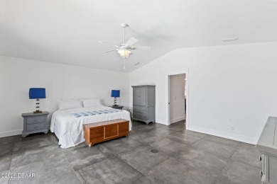 Experience the best of Florida living in this stunning two-story on Ocean Palm Golf Course in Florida - for sale on GolfHomes.com, golf home, golf lot