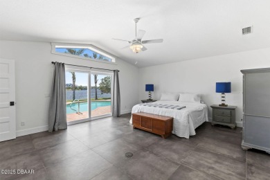 Experience the best of Florida living in this stunning two-story on Ocean Palm Golf Course in Florida - for sale on GolfHomes.com, golf home, golf lot