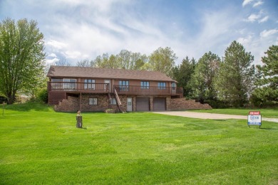 Welcome to your serene getaway, nestled in a quiet, picturesque on Calamus Golf Course in Nebraska - for sale on GolfHomes.com, golf home, golf lot