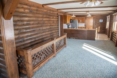 Welcome to your serene getaway, nestled in a quiet, picturesque on Calamus Golf Course in Nebraska - for sale on GolfHomes.com, golf home, golf lot