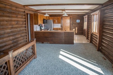 Welcome to your serene getaway, nestled in a quiet, picturesque on Calamus Golf Course in Nebraska - for sale on GolfHomes.com, golf home, golf lot