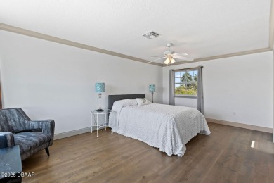 Experience the best of Florida living in this stunning two-story on Ocean Palm Golf Course in Florida - for sale on GolfHomes.com, golf home, golf lot