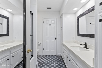 Experience the best of Florida living in this stunning two-story on Ocean Palm Golf Course in Florida - for sale on GolfHomes.com, golf home, golf lot
