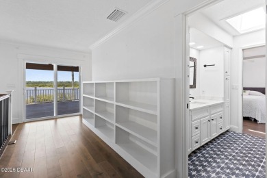 Experience the best of Florida living in this stunning two-story on Ocean Palm Golf Course in Florida - for sale on GolfHomes.com, golf home, golf lot