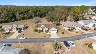 Beautiful 3/2/2 home in Oak Run, a popular 55+ gated golf course on Royal Oaks Golf Club in Florida - for sale on GolfHomes.com, golf home, golf lot