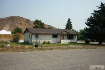 IF you are looking for a reasonable priced home in the city on Challis Golf Course in Idaho - for sale on GolfHomes.com, golf home, golf lot