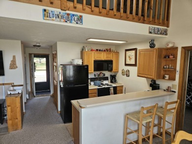Check out this 3 bedroom, 2 and half bath year round getaway in on Jack O Lantern Resort in New Hampshire - for sale on GolfHomes.com, golf home, golf lot