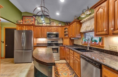 Tucked away in the trees on two beautifully wooded lots at Lake on Lake Mohawk Golf Club in Ohio - for sale on GolfHomes.com, golf home, golf lot