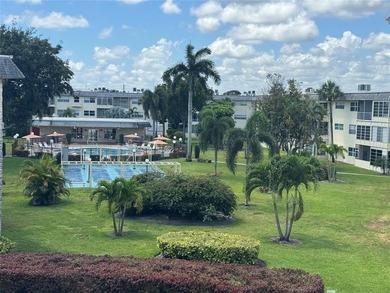 Spacious 1/1 condo featuring a kitchen with easy pass-through to on Lauderhill Golf Course in Florida - for sale on GolfHomes.com, golf home, golf lot