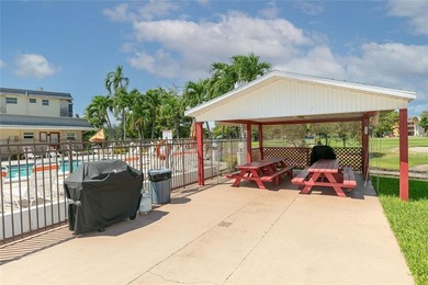 Spacious 1/1 condo featuring a kitchen with easy pass-through to on Lauderhill Golf Course in Florida - for sale on GolfHomes.com, golf home, golf lot