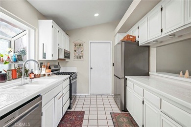 Welcome to 29827 Camino Cristal, a beautifully upgraded on Menifee Lakes Country Club - Lakes in California - for sale on GolfHomes.com, golf home, golf lot