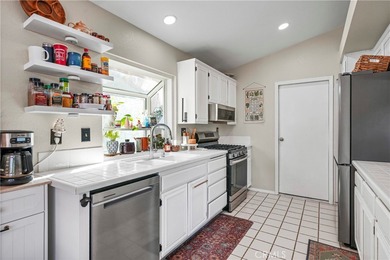 Welcome to 29827 Camino Cristal, a beautifully upgraded on Menifee Lakes Country Club - Lakes in California - for sale on GolfHomes.com, golf home, golf lot