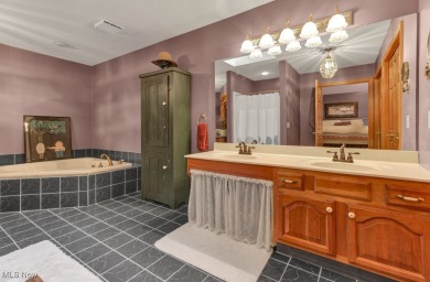Tucked away in the trees on two beautifully wooded lots at Lake on Lake Mohawk Golf Club in Ohio - for sale on GolfHomes.com, golf home, golf lot