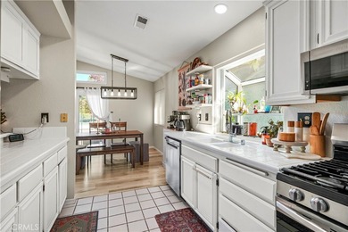 Welcome to 29827 Camino Cristal, a beautifully upgraded on Menifee Lakes Country Club - Lakes in California - for sale on GolfHomes.com, golf home, golf lot