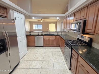 Sought-after gated golf course community home in Glen Eagles! on London Bridge Golf Course in Arizona - for sale on GolfHomes.com, golf home, golf lot