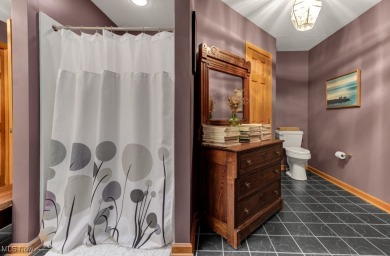 Tucked away in the trees on two beautifully wooded lots at Lake on Lake Mohawk Golf Club in Ohio - for sale on GolfHomes.com, golf home, golf lot