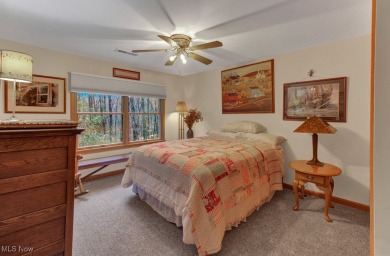 Tucked away in the trees on two beautifully wooded lots at Lake on Lake Mohawk Golf Club in Ohio - for sale on GolfHomes.com, golf home, golf lot