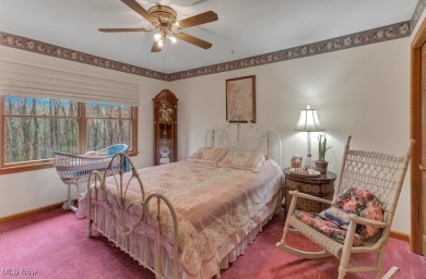 Tucked away in the trees on two beautifully wooded lots at Lake on Lake Mohawk Golf Club in Ohio - for sale on GolfHomes.com, golf home, golf lot