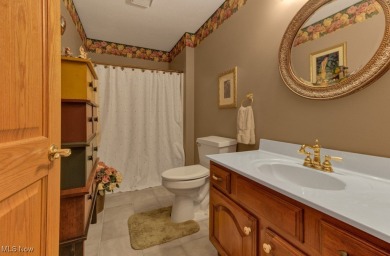 Tucked away in the trees on two beautifully wooded lots at Lake on Lake Mohawk Golf Club in Ohio - for sale on GolfHomes.com, golf home, golf lot