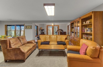 Tucked away in the trees on two beautifully wooded lots at Lake on Lake Mohawk Golf Club in Ohio - for sale on GolfHomes.com, golf home, golf lot