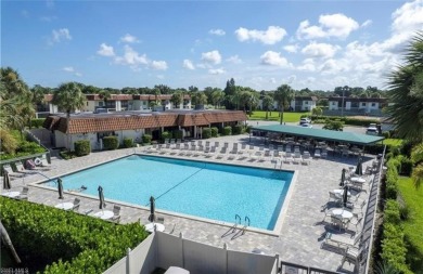 This furnished, turnkey ground-floor condo offers a lake view on Golden Gate Country Club in Florida - for sale on GolfHomes.com, golf home, golf lot