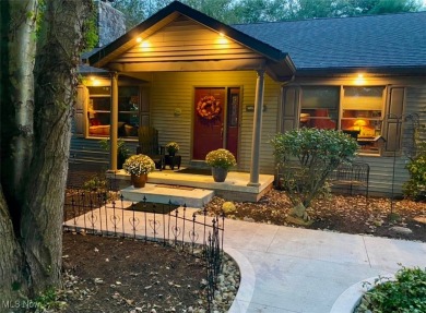 Tucked away in the trees on two beautifully wooded lots at Lake on Lake Mohawk Golf Club in Ohio - for sale on GolfHomes.com, golf home, golf lot