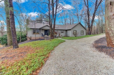 Tucked away in the trees on two beautifully wooded lots at Lake on Lake Mohawk Golf Club in Ohio - for sale on GolfHomes.com, golf home, golf lot