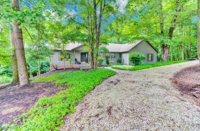 Tucked away in the trees on two beautifully wooded lots at Lake on Lake Mohawk Golf Club in Ohio - for sale on GolfHomes.com, golf home, golf lot